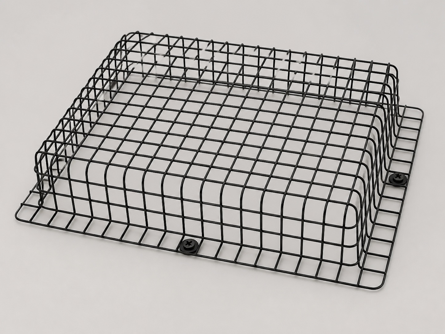 Studio presentation of a black Vent Defender Pro steel roof vent guard, showing its protective mesh and mounting flange.